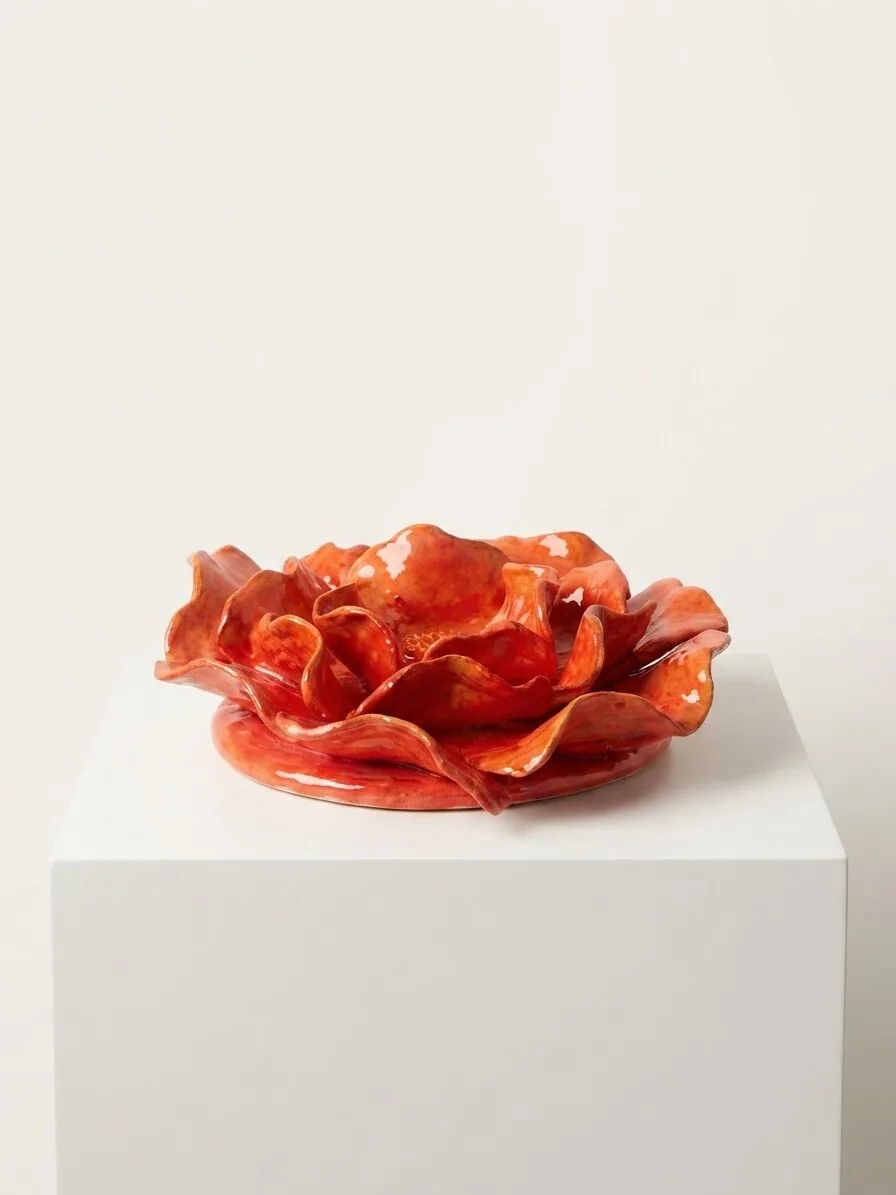 Poppy Bloom Dish — a sculptural ceramic dish formed as an open red-orange poppy with ruffled petals.