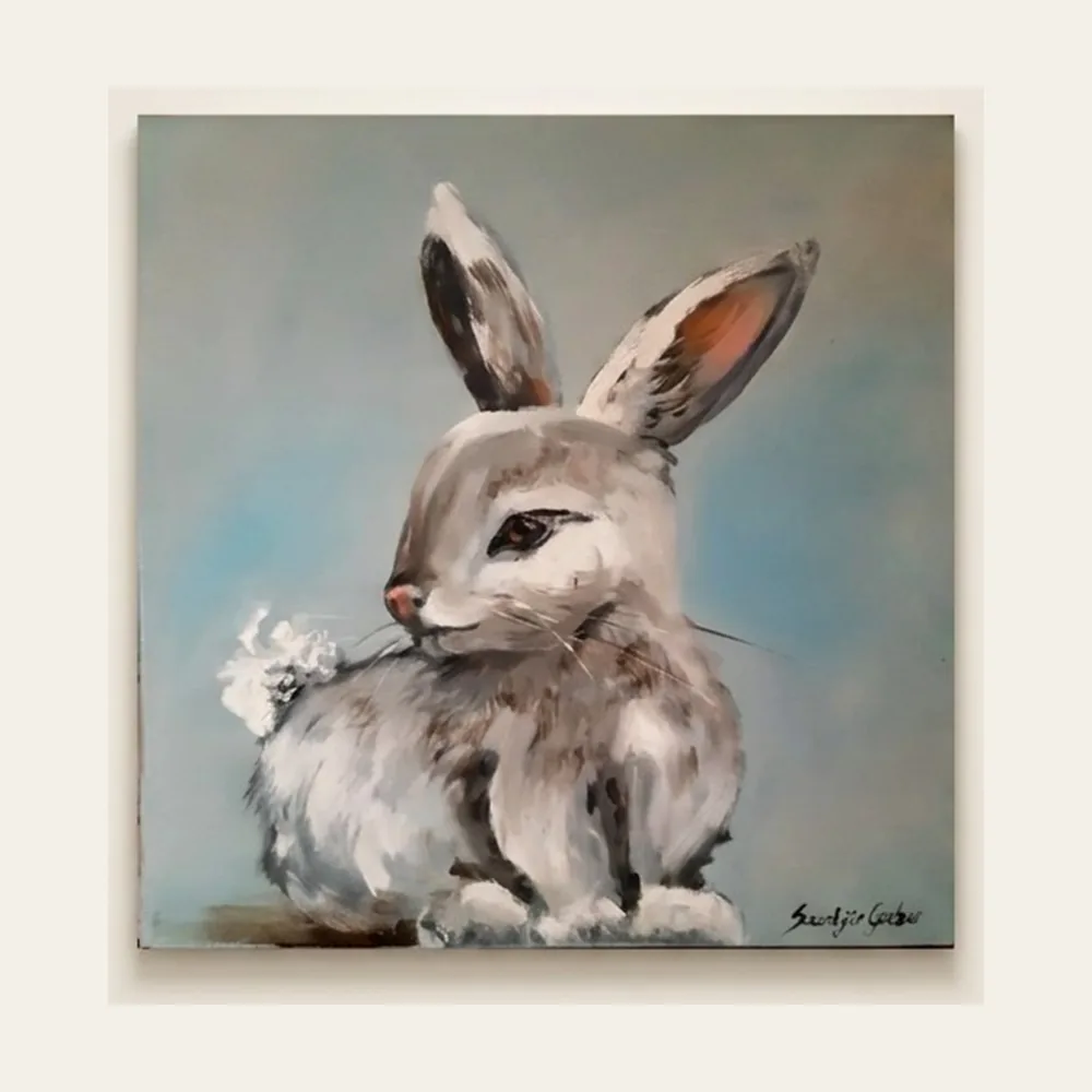 Hare, Turning — a pale grey hare seated in profile, glancing to one side against a blue ground.
