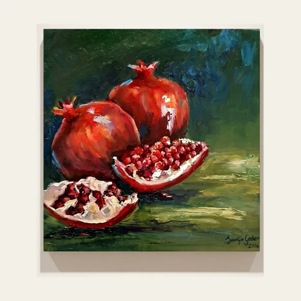 Pomegranate II — two pomegranates and a split wedge of ruby seeds on a green ground.