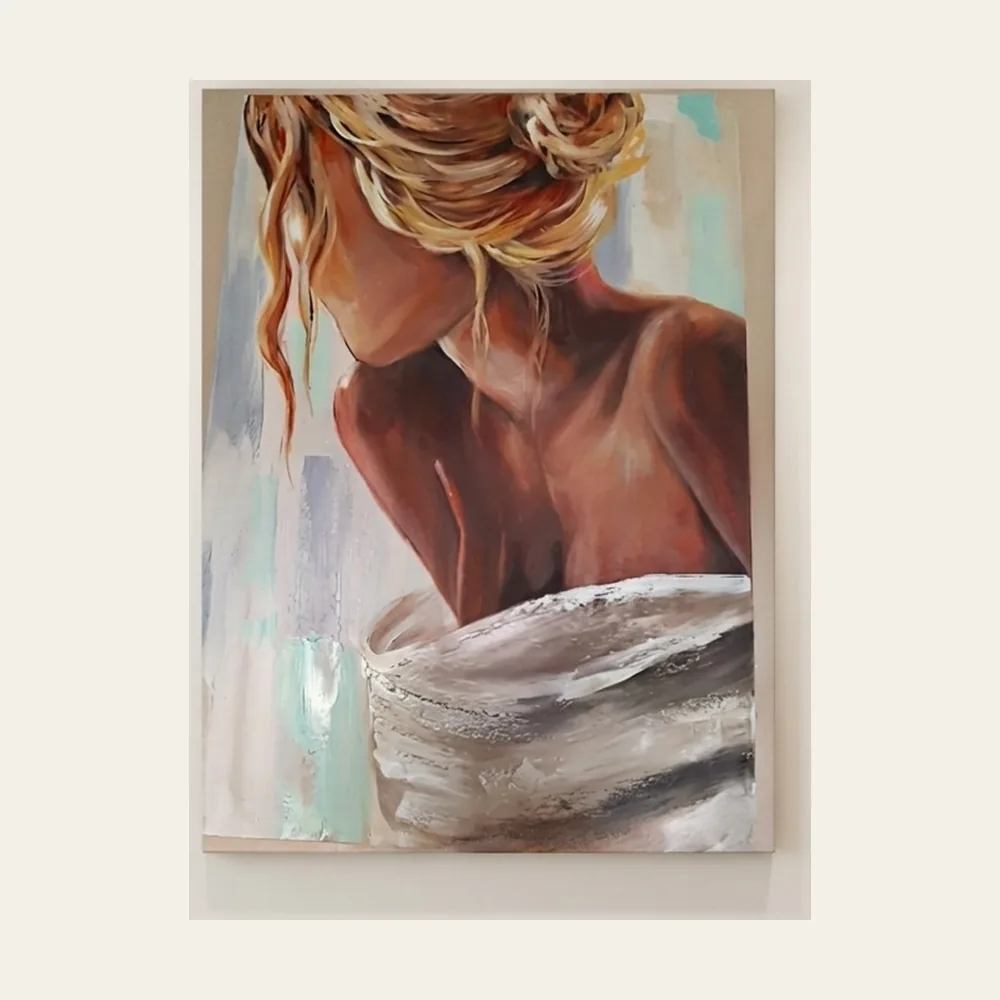 Reverie — the bare back and shoulders of a woman with her hair pinned up, holding a pale wrap.