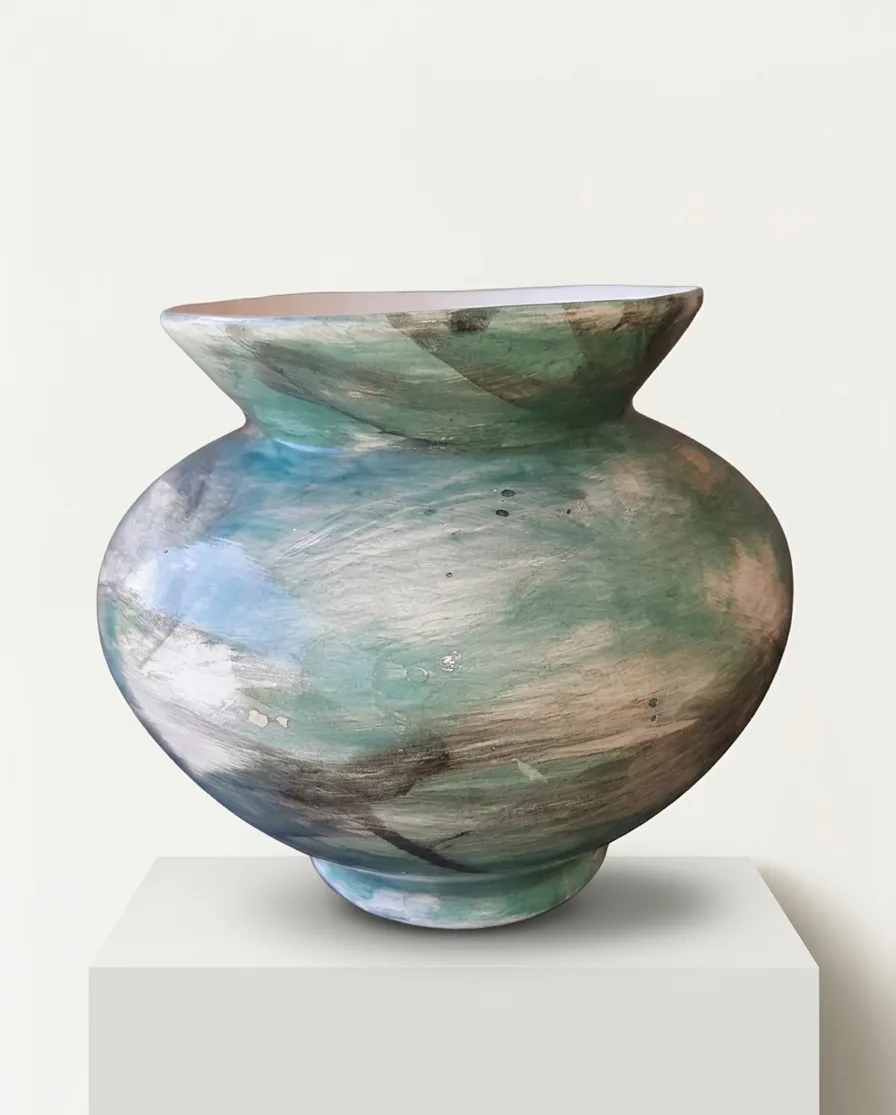 Verdigris Urn — a wide-bellied thrown urn brushed in green, blue and sand, with a flared collar.
